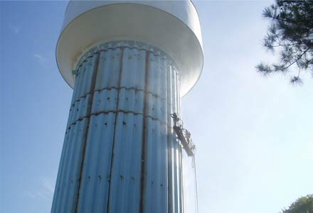 Corrosion Control field crew recoating a tank column